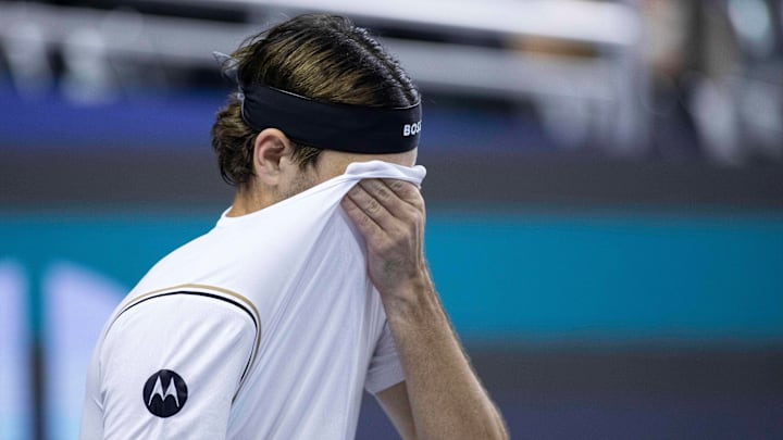 TAYLOR FRITZ (USA) put his shirt over his face in a singles match against DENIS SHAPOVALOV (CAN) during day six of the 2025 Dallas Open at the Star in Frisco, TX. TAYLOR FRITZ (USA) put his shirt over his face in a singles match against DENIS SHAPOVALOV (CAN) during day six of the 2025 Dallas Open at the Star in Frisco, TX.
