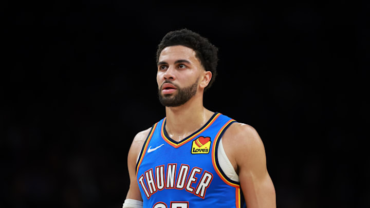 Jan 4, 2026; Phoenix, Arizona, USA; Oklahoma City Thunder guard Ajay Mitchell (25). Mandatory Credit: Mark J. Rebilas-Imagn Images