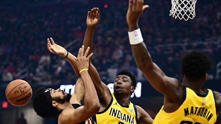 May 13, 2025; Cleveland, Ohio, USA; Indiana Pacers center Thomas Bryant (3) goes for a rebound against Cleveland Cavaliers center Jarrett Allen (31) during the first half of game five of the second round for the 2025 NBA Playoffs at Rocket Arena. Mandatory Credit: Ken Blaze-Imagn Images