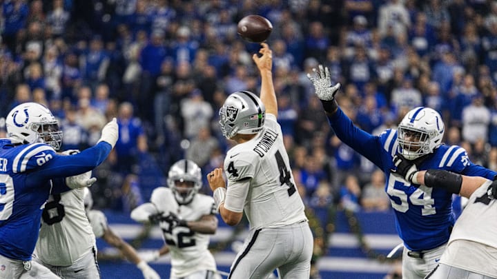 Dec 31, 2023; Indianapolis, Indiana, USA; Las Vegas Raiders quarterback Aidan O'Connell (4) passes a Dec 31, 2023; Indianapolis, Indiana, USA; Las Vegas Raiders quarterback Aidan O'Connell (4) passes a