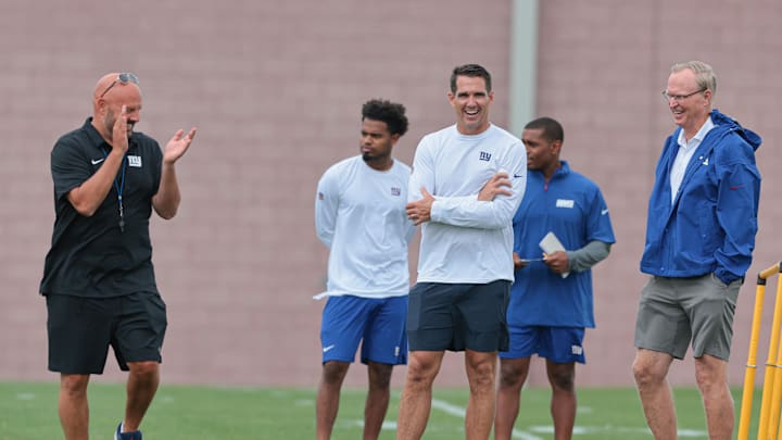 New York Giants head coach Brian Dabol, right, talks with general manager Joe Schoen, center, and president and CEO John Mara, right. New York Giants head coach Brian Dabol, right, talks with general manager Joe Schoen, center, and president and CEO John Mara, right.