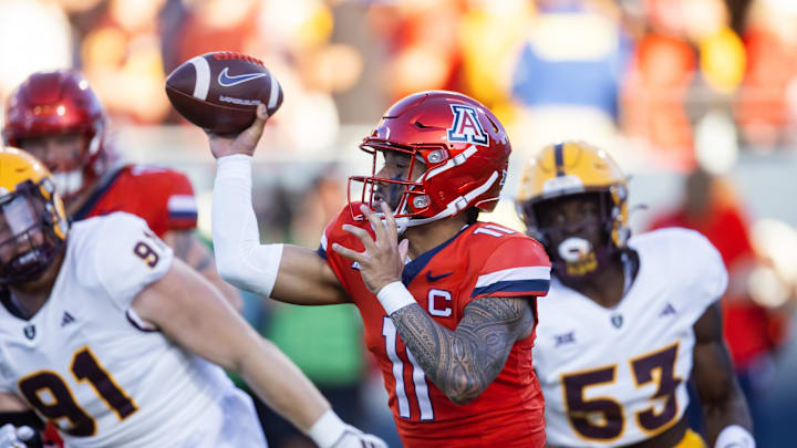 Nov 30, 2024; Tucson, Arizona, USA; Arizona Wildcats quarterback Noah Fifita (11) against the Arizona State Sun Devils in the second half during the Territorial Cup at Arizona Stadium. Mandatory Credit: Mark J. Rebilas-Imagn Images