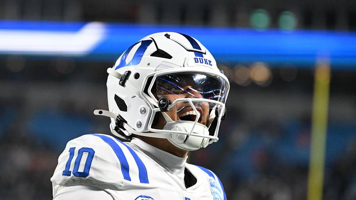 Duke quarterback Darian Mensah (10) celebrates after the Blue Devils score a touchdown in overtime during the ACC Championship Duke quarterback Darian Mensah (10) celebrates after the Blue Devils score a touchdown in overtime during the ACC Championship