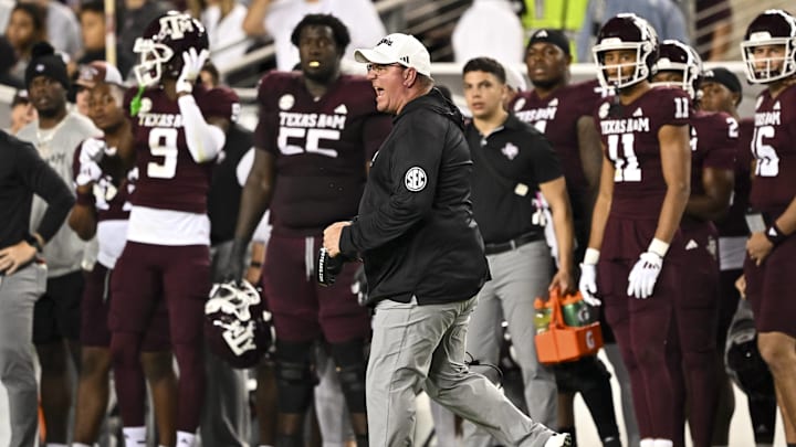 Nov 16, 2024; College Station, Texas, USA; Texas A&M Aggies coach Mike Elko reacts during the second quarter against the New Mexico State Aggies at Kyle Field.