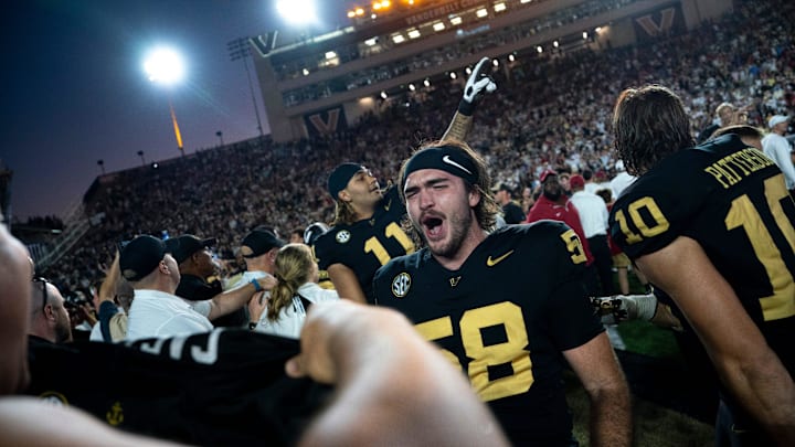 Vanderbilt Commodores linebacker Carson Casteel (58) celebrates after knocking off the Alabama Crimson Tide 40-35 at Vanderbilt Stadium in Nashville, Tenn., Saturday, Oct. 5, 2024.