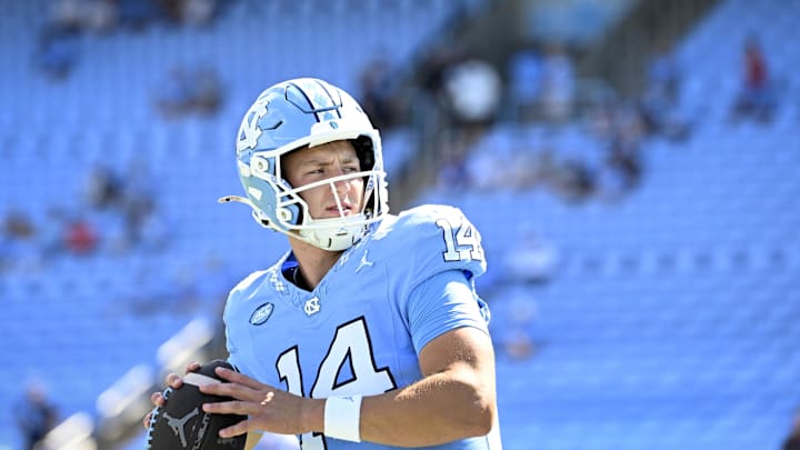 Sep 13, 2025; Chapel Hill, North Carolina, USA; North Carolina Tar Heels quarterback Max Johnson (14) passes before the game at Kenan Stadium. 