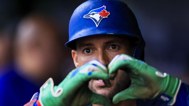 Sep 2, 2025; Cincinnati, Ohio, USA; Toronto Blue Jays designated hitter George Springer (4) reacts after hitting a solo home run in the first inning against the Cincinnati Reds at Great American Ball Park. Mandatory Credit: Katie Stratman-Imagn Images