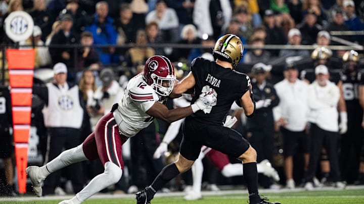 South Carolina Gamecocks edge Jatius Geer (12) goes to take down Vanderbilt Commodores quarterback Diego Pavia (2) during the second half of the game at FirstBank Stadium in Nashville, Tenn., Saturday, Nov. 9, 2024.