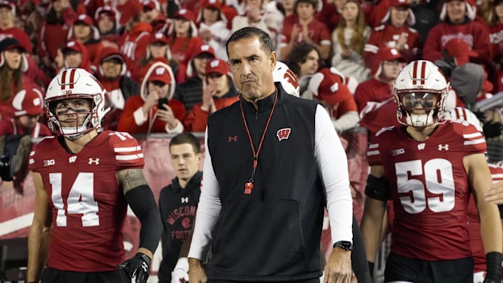 Nov 16, 2024; Madison, Wisconsin, USA;  Wisconsin Badgers head coach Luke Fickell during warmups prior to the game against the Oregon Ducks at Camp Randall Stadium. Mandatory Credit: Jeff Hanisch-Imagn Images