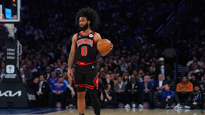 Feb 20, 2025; New York, New York, USA; Chicago Bulls point guard Coby White (0) looks to pass the ball