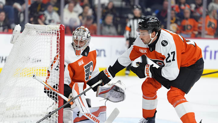 Feb 28, 2026; Philadelphia, Pennsylvania, USA; Philadelphia Flyers left wing Noah Cates (27) reaches for the puck with goalie Dan Vladar (80) against the Boston Bruins in the first period at Xfinity Mobile Arena. Mandatory Credit: Kyle Ross-Imagn Images Feb 28, 2026; Philadelphia, Pennsylvania, USA; Philadelphia Flyers left wing Noah Cates (27) reaches for the puck with goalie Dan Vladar (80) against the Boston Bruins in the first period at Xfinity Mobile Arena. Mandatory Credit: Kyle Ross-Imagn Images