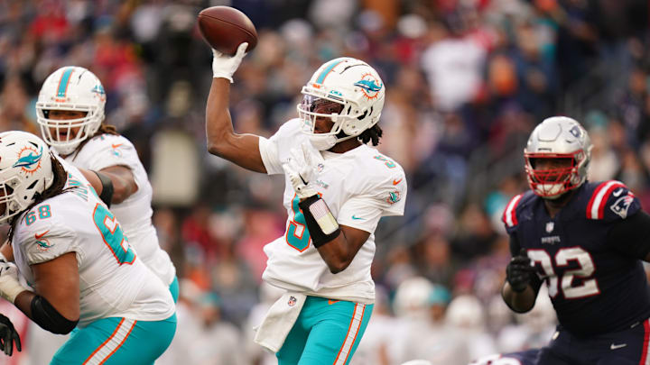 Jan 1, 2023; Foxborough, Massachusetts, USA; Miami Dolphins quarterback Teddy Bridgewater (5) throws a pass against the New England Patriots in the first half at Gillette Stadium. 