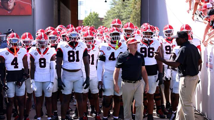 Sep 19, 2026; Fayetteville, Arkansas, USA; Georgia Bulldogs head coach Kirby Smart leads the team onto the field before the game against the Arkansas Razorbacks at Donald W. Reynolds Razorback Stadium. Mandatory Credit: Nelson Chenault-Imagn Images Sep 19, 2026; Fayetteville, Arkansas, USA; Georgia Bulldogs head coach Kirby Smart leads the team onto the field before the game against the Arkansas Razorbacks at Donald W. Reynolds Razorback Stadium. Mandatory Credit: Nelson Chenault-Imagn Images