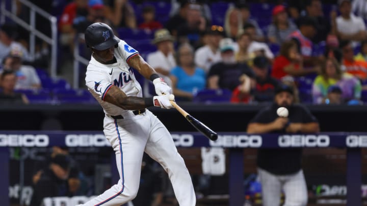 Miami Marlins shortstop Tim Anderson (7) hits a single against the St. Louis Cardinals during the sixth inning at loanDepot Park on June 19.