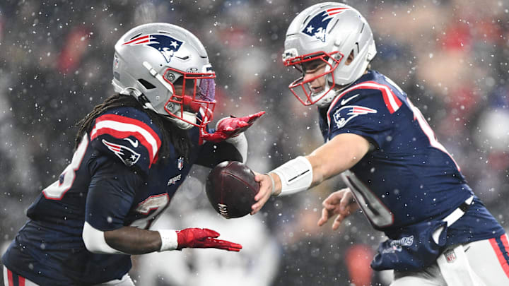 Jan 18, 2026; Foxborough, MA, USA; New England Patriots running back Rhamondre Stevenson (38) receives a hand off in the fourth quarter against the Houston Texans in an AFC Divisional Round game at Gillette Stadium. Mandatory Credit: Brian Fluharty-Imagn Images