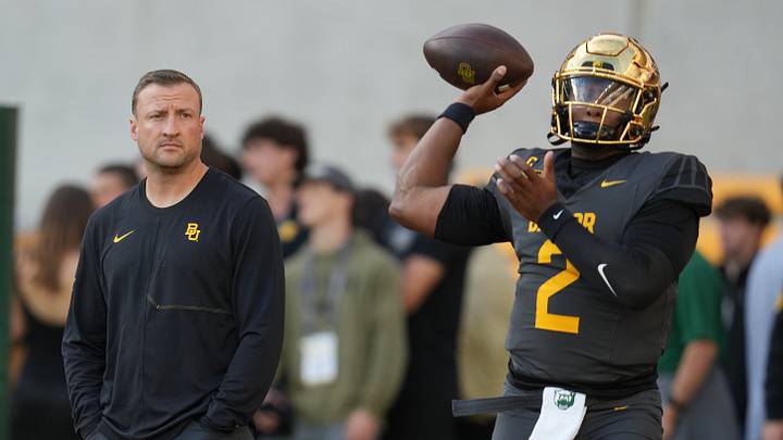 Oct 17, 2026; Waco, Texas, USA; Baylor Bears quarterback DJ Lagway (2) and offensive coordinator Jake Spatial during warmups before the game against the TCU Horned Frogs at McLane Stadium. Mandatory Credit: Chris Jones-Imagn Images Oct 17, 2026; Waco, Texas, USA; Baylor Bears quarterback DJ Lagway (2) and offensive coordinator Jake Spatial during warmups before the game against the TCU Horned Frogs at McLane Stadium. Mandatory Credit: Chris Jones-Imagn Images