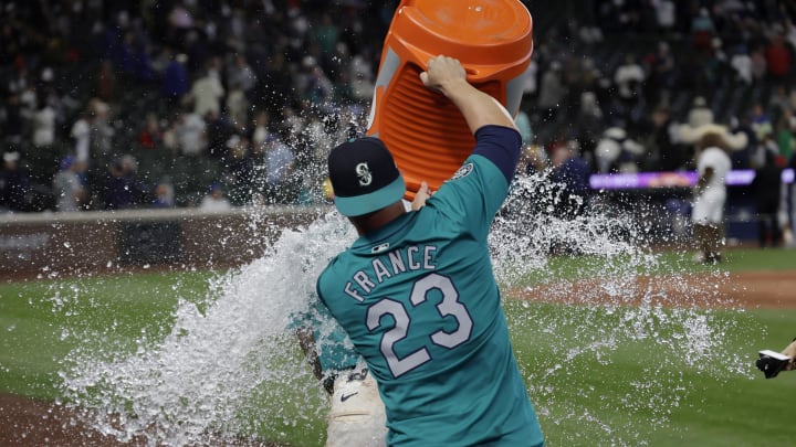 Jun 1, 2024; Seattle, Washington, USA; Seattle Mariners first baseman Ty France (23) dumps ice water on Seattle Mariners second baseman Ryan Bliss after the 9-0 win over the Los Angeles Angels at T-Mobile Park. Mandatory Credit: John Froschauer-USA TODAY Sports Jun 1, 2024; Seattle, Washington, USA; Seattle Mariners first baseman Ty France (23) dumps ice water on Seattle Mariners second baseman Ryan Bliss after the 9-0 win over the Los Angeles Angels at T-Mobile Park. Mandatory Credit: John Froschauer-USA TODAY Sports