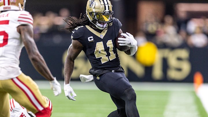 Sep 14, 2025; New Orleans, Louisiana, USA;  New Orleans Saints running back Alvin Kamara (41) runs against the San Francisco 49ers during the first half at Caesars Superdome. Mandatory Credit: Stephen Lew-Imagn Images