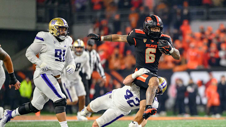 Nov 18, 2023; Corvallis, Oregon, USA; Oregon State Beavers running back Damien Martinez (6) runs the ball during the third quarter against the Washington Huskies at Reser Stadium. Mandatory Credit: Craig Strobeck-USA TODAY Sports