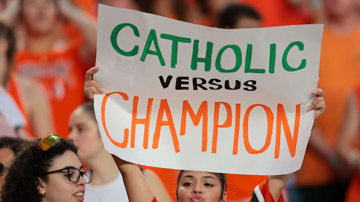 Aug 31, 2025; Miami Gardens, Florida, USA; Miami Hurricanes fans react before the game against the Notre Dame Fighting Irish at Hard Rock Stadium. Mandatory Credit: Sam Navarro-Imagn Images Aug 31, 2025; Miami Gardens, Florida, USA; Miami Hurricanes fans react before the game against the Notre Dame Fighting Irish at Hard Rock Stadium. Mandatory Credit: Sam Navarro-Imagn Images