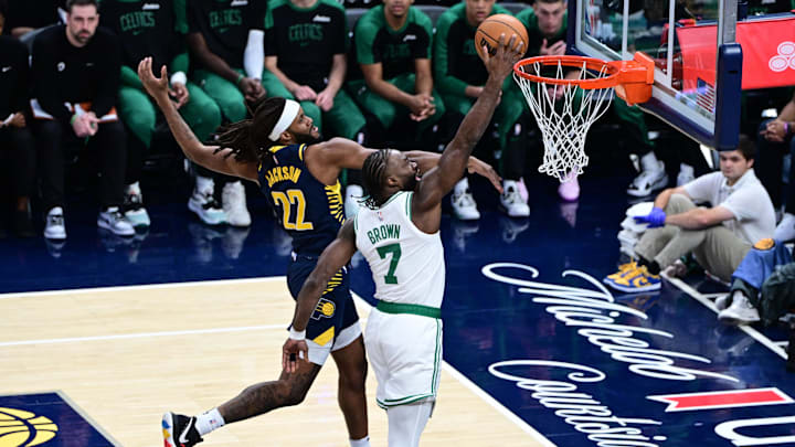 Oct 30, 2024; Indianapolis, Indiana, USA; Boston Celtics guard Jaylen Brown (7) shoots the ball in front of Indiana Pacers forward Isaiah Jackson (22) during the first quarter at Gainbridge Fieldhouse. Mandatory Credit: Marc Lebryk-Imagn Images