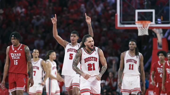 Jan 6, 2026; Houston, Texas, USA; Houston Cougars guard Emanuel Sharp (21) reacts after a play during the second half against the Texas Tech Red Raiders at Fertitta Center. Mandatory Credit: Troy Taormina-Imagn Images