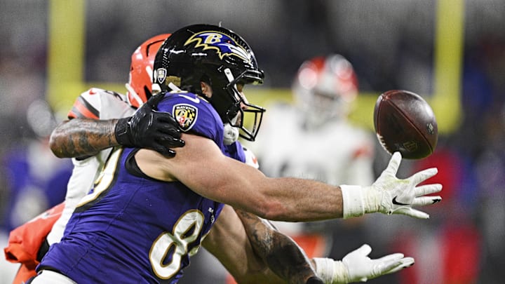 Jan 4, 2025; Baltimore, Maryland, USA; Baltimore Ravens tight end Mark Andrews (89) makes a catch for a touchdown during the second quarter as Cleveland Browns safety Grant Delpit (9) defends at M&T Bank Stadium. Mandatory Credit: Tommy Gilligan-Imagn Images