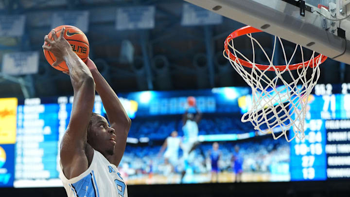 Nov 7, 2025; Chapel Hill, North Carolina, USA; North Carolina Tar Heels forward Caleb Wilson (8) scores in the second half at Dean E. Smith Center. Mandatory Credit: Bob Donnan-Imagn Images