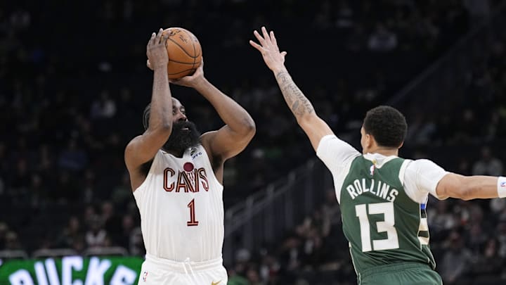 Mar 17, 2026; Milwaukee, Wisconsin, USA; Cleveland Cavaliers guard James Harden (1) shoots against Milwaukee Bucks guard Ryan Rollins (13) in the first half at Fiserv Forum. Mandatory Credit: Michael McLoone-Imagn Images