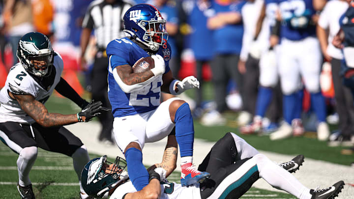 Oct 20, 2024; East Rutherford, New Jersey, USA; New York Giants running back Tyrone Tracy Jr. (29) is tackled by Philadelphia Eagles linebacker Zack Baun (53) during the first half at MetLife Stadium. Oct 20, 2024; East Rutherford, New Jersey, USA; New York Giants running back Tyrone Tracy Jr. (29) is tackled by Philadelphia Eagles linebacker Zack Baun (53) during the first half at MetLife Stadium.