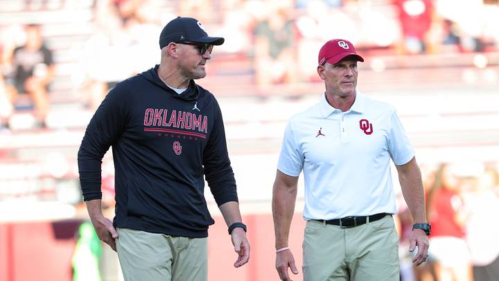 Oklahoma Sooners head coach Brent Venables (right) speaks to tight ends coach Jason Witten before the game against the UTEP Miners Oklahoma Sooners head coach Brent Venables (right) speaks to tight ends coach Jason Witten before the game against the UTEP Miners