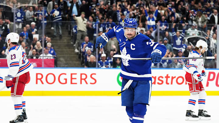 Oct 19, 2024; Toronto, Ontario, CAN; Toronto Maple Leafs center Auston Matthews (34) celebrates after scoring a goal New York Rangers during the third period at Scotiabank Arena. Mandatory Credit: Nick Turchiaro-Imagn Images