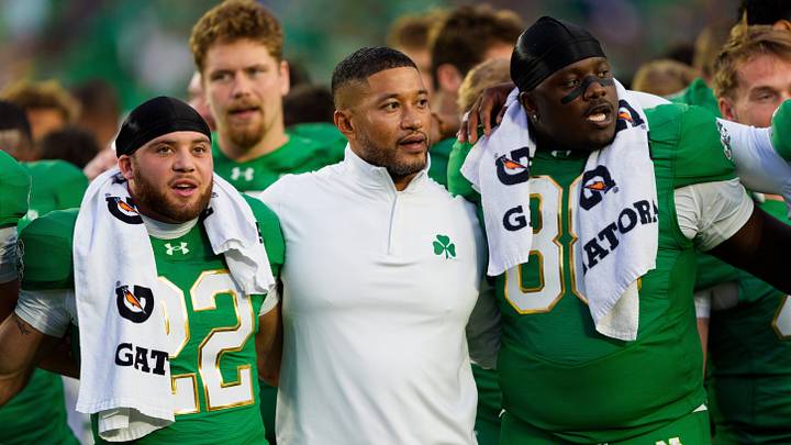 Notre Dame head coach Marcus Freeman, center, celebrates with his team after winning a NCAA football game 58-7 against Stanford at Notre Dame Stadium on Saturday, Oct. 10, 2026, in South Bend.