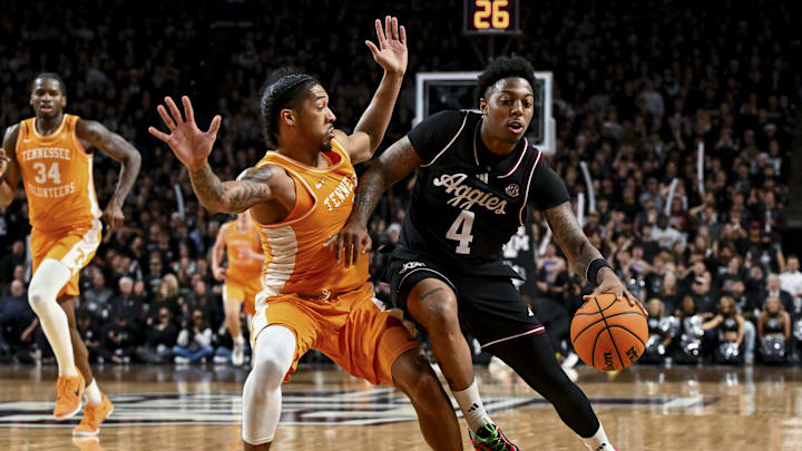 Feb 22, 2025; College Station, Texas, USA; Texas A&M Aggies guard Wade Taylor IV (4) drives against Tennessee Volunteers guard Zakai Zeigler (5) during the first half at Reed Arena. Mandatory Credit: Maria Lysaker-Imagn Images Feb 22, 2025; College Station, Texas, USA; Texas A&M Aggies guard Wade Taylor IV (4) drives against Tennessee Volunteers guard Zakai Zeigler (5) during the first half at Reed Arena. Mandatory Credit: Maria Lysaker-Imagn Images