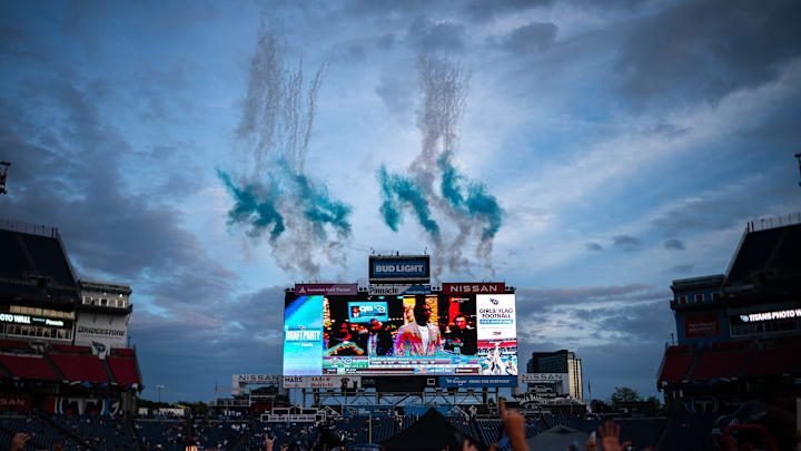Fans cheer as the Tennessee Titans select Miami Hurricanes quarterback Cam Ward with the first overall pick during the Titans NFL Draft Watch Party at Nissan Stadium in Nashville, Tenn., Thursday, April 24, 2025.