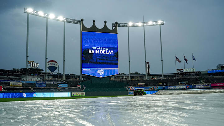 Jul 16, 2023; Kansas City, Missouri, USA; A general view of the tarp covered field during the rain delay prior to the game between the Kansas City Royals and Tampa Bay Rays at Kauffman Stadium. Mandatory Credit: Denny Medley-Imagn Images