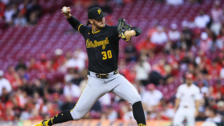 Sep 24, 2025; Cincinnati, Ohio, USA; Pittsburgh Pirates starting pitcher Paul Skenes (30) pitches against the Cincinnati Reds in the first inning at Great American Ball Park. Mandatory Credit: Katie Stratman-Imagn Images