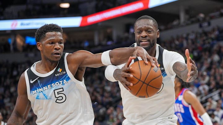 Nov 27, 2024; Minneapolis, Minnesota, USA; Minnesota Timberwolves guard Anthony Edwards (5) and forward Julius Randle (30) chase a loose ball against the Sacramento Kings in the second quarter at Target Center. Mandatory Credit: Brad Rempel-Imagn Images Nov 27, 2024; Minneapolis, Minnesota, USA; Minnesota Timberwolves guard Anthony Edwards (5) and forward Julius Randle (30) chase a loose ball against the Sacramento Kings in the second quarter at Target Center. Mandatory Credit: Brad Rempel-Imagn Images
