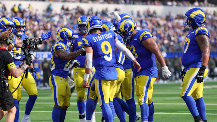 Nov 2, 2025; Inglewood, California, USA; Los Angeles Rams quarterback Matthew Stafford (9) and teammates celebrate a touchdown against the New Orleans Saints during the first half at SoFi Stadium. Mandatory Credit: Kiyoshi Mio-Imagn Images