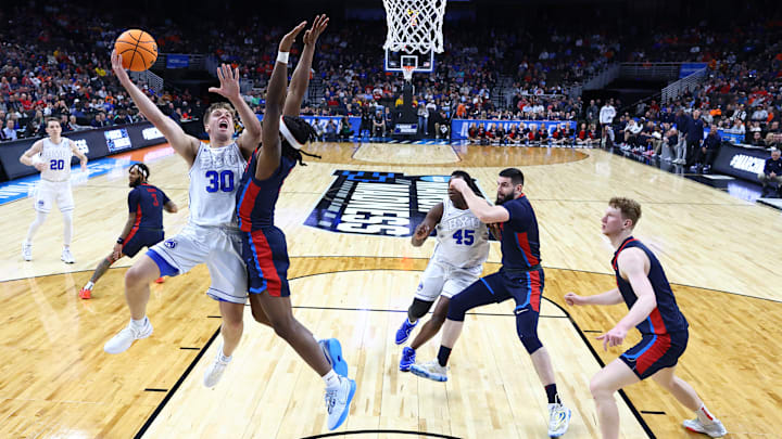 Dallin Hall attempts a contested layup against Duquesne