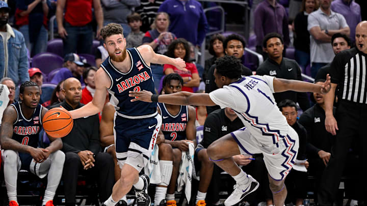 Jan 10, 2026; Fort Worth, Texas, USA; Arizona Wildcats guard Anthony Dell'orso (3) brings the ball up court past TCU Horned Frogs guard Jayden Pierre (1) during the game between the Horned Frogs and the Wildcats at Ed and Rae Schollmaier Arena. Mandatory Credit: Jerome Miron-Imagn Images