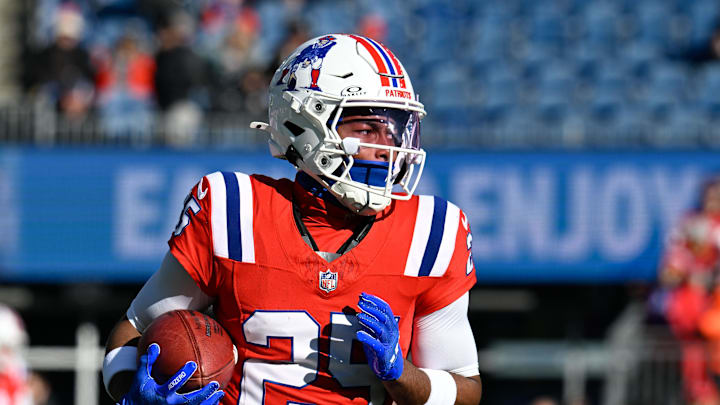 Dec 1, 2024; Foxborough, Massachusetts, USA; New England Patriots cornerback Marcus Jones (25) warms up before a game against the Indianapolis Colts at Gillette Stadium. Mandatory Credit: Eric Canha-Imagn Images