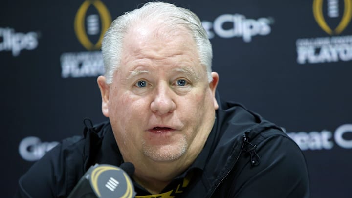 Jan 18, 2025; Atlanta, GA, USA; Ohio State Buckeyes offensive coordinator Chip Kelly talks to the media during 2025 CFP National Championship Media Day at Georgia World Congress Center, Building A. Mandatory Credit: Brett Davis-Imagn Images
