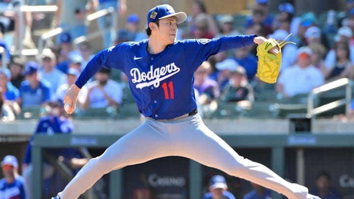 Feb 25, 2026; Salt River Pima-Maricopa, Arizona, USA; Los Angeles Dodgers pitcher Roki Sasaki (11) throws in the first inning against the Arizona Diamondbacks at Salt River Fields at Talking Stick. Mandatory Credit: Matt Kartozian-Imagn Images Feb 25, 2026; Salt River Pima-Maricopa, Arizona, USA; Los Angeles Dodgers pitcher Roki Sasaki (11) throws in the first inning against the Arizona Diamondbacks at Salt River Fields at Talking Stick. Mandatory Credit: Matt Kartozian-Imagn Images