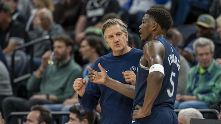 Nov 4, 2024; Minneapolis, Minnesota, USA; Minnesota Timberwolves head coach Chris Finch talks with Minnesota Timberwolves guard Anthony Edwards (5) during a free throw against the Charlotte Hornets in the second half at Target Center. Mandatory Credit: Jesse Johnson-Imagn Images