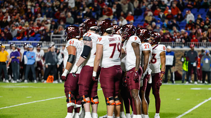 Nov 23, 2024; Durham, North Carolina, USA; Virginia Tech Hokies huddle during the second half of the game against Duke Blue Devils at Wallace Wade Stadium. Mandatory Credit: Jaylynn Nash-Imagn Images Nov 23, 2024; Durham, North Carolina, USA; Virginia Tech Hokies huddle during the second half of the game against Duke Blue Devils at Wallace Wade Stadium. Mandatory Credit: Jaylynn Nash-Imagn Images