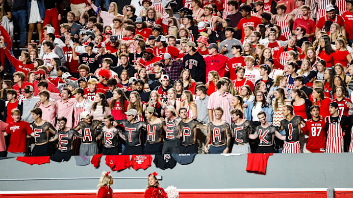 Nov 9, 2024; Raleigh, North Carolina, USA; North Carolina State Wolfpack fans during the second half of the game against Duke Blue Devils at Carter-Finley Stadium. Mandatory Credit: Jaylynn Nash-Imagn Images Nov 9, 2024; Raleigh, North Carolina, USA; North Carolina State Wolfpack fans during the second half of the game against Duke Blue Devils at Carter-Finley Stadium. Mandatory Credit: Jaylynn Nash-Imagn Images