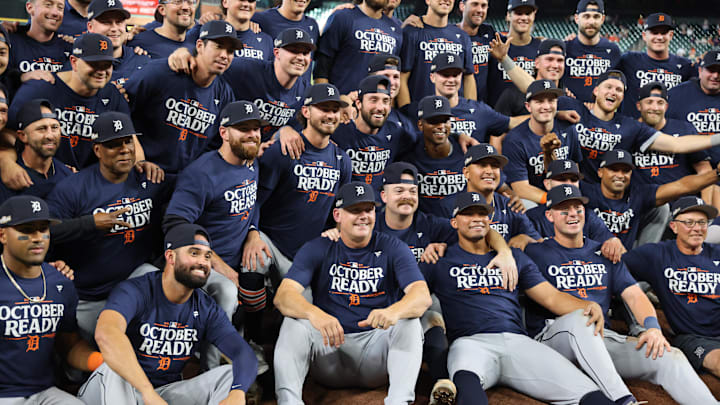 Oct 2, 2024; Houston, Texas, USA; Detroit Tigers manager A.J. Hinch (middle, seated) celebrates with his team after defeating the Houston Astros in game two of the Wildcard round for the 2024 MLB Playoffs at Minute Maid Park.