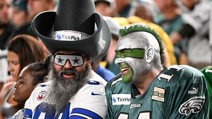 Sep 4, 2025; Philadelphia, Pennsylvania, USA; A Dallas Cowboys fans and a Philadelphia Eagles fan smile during the third quarter of the game at Lincoln Financial Field. Mandatory Credit: Eric Hartline-Imagn Images Sep 4, 2025; Philadelphia, Pennsylvania, USA; A Dallas Cowboys fans and a Philadelphia Eagles fan smile during the third quarter of the game at Lincoln Financial Field. Mandatory Credit: Eric Hartline-Imagn Images