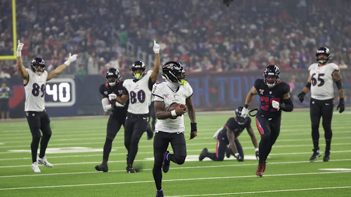 Dec 25, 2024; Houston, Texas, USA; Baltimore Ravens quarterback Lamar Jackson (8) rushes for a 48 yard touchdown against the Houston Texans in the third quarter at NRG Stadium. Mandatory Credit: Thomas Shea-Imagn Images